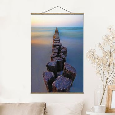 Fabric print with poster hangers - Groynes At Sunset At The Ocean - Portrait format 2:3
