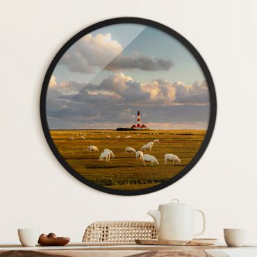 Circular framed print - North Sea Lighthouse With Flock Of Sheep