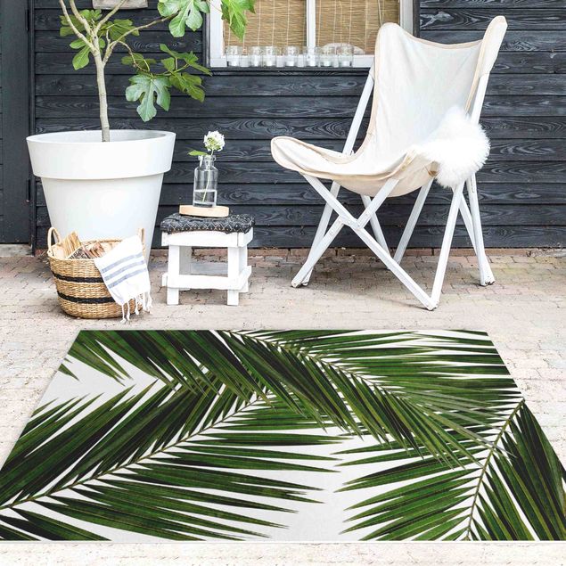 outdoor patio rugs View Through Green Palm Leaves