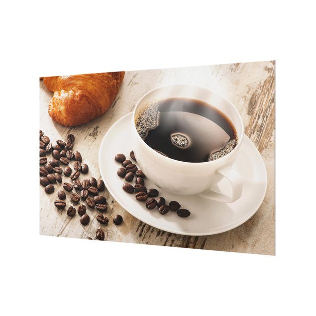 Splashback - Steaming coffee cup with coffee beans