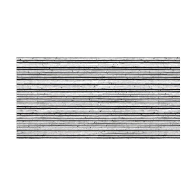 Stone look rugs Wooden Wall With Narrow Strips Black And White