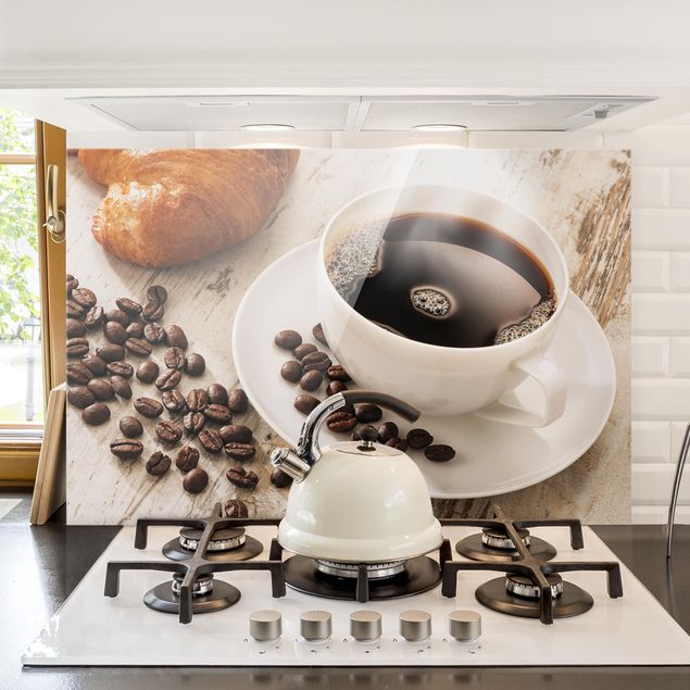 Glass splashback baking and coffee Steaming coffee cup with coffee beans