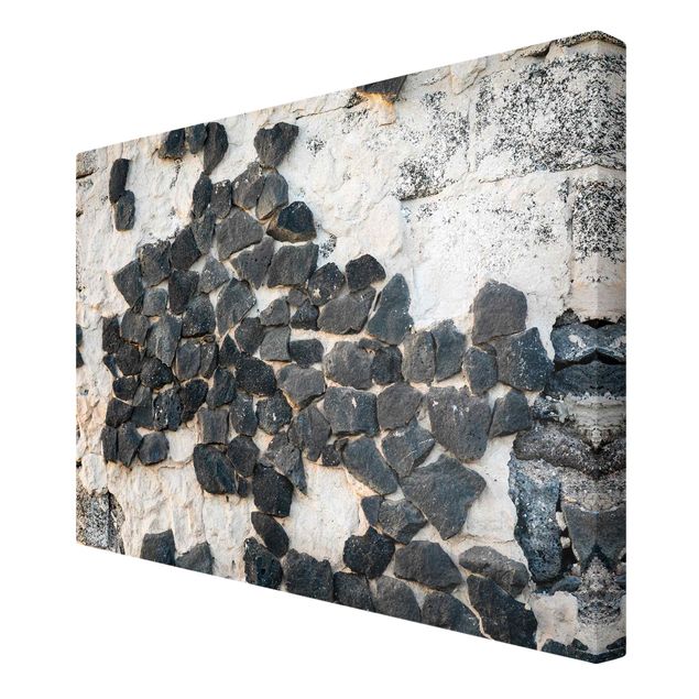 Print on canvas - Wall With Black Stones