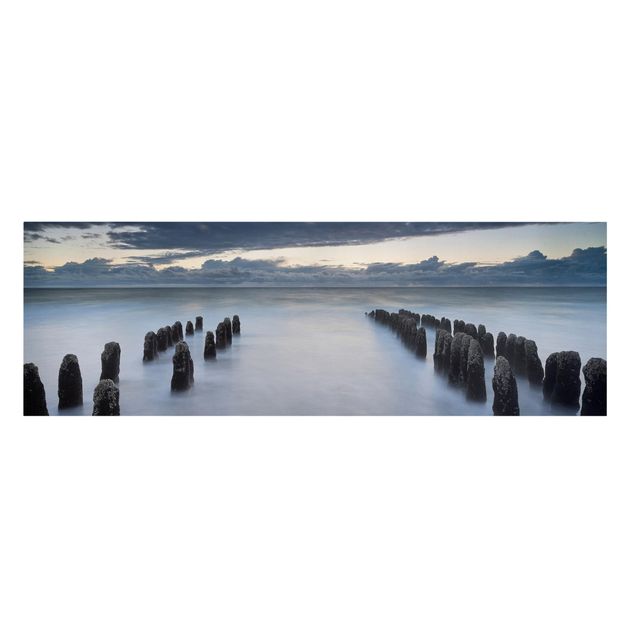 Print on canvas - Old Wooden Posts In The North Sea On Sylt