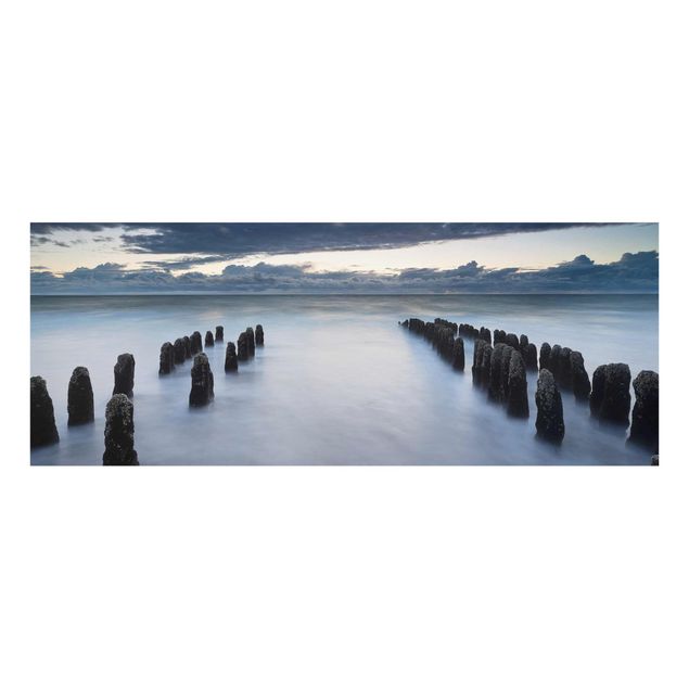Glass print - Old Wooden Posts In The North Sea On Sylt