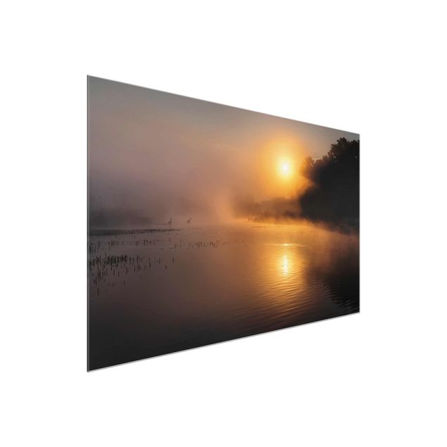 Glass print - Sunrise on the lake with deers in the fog