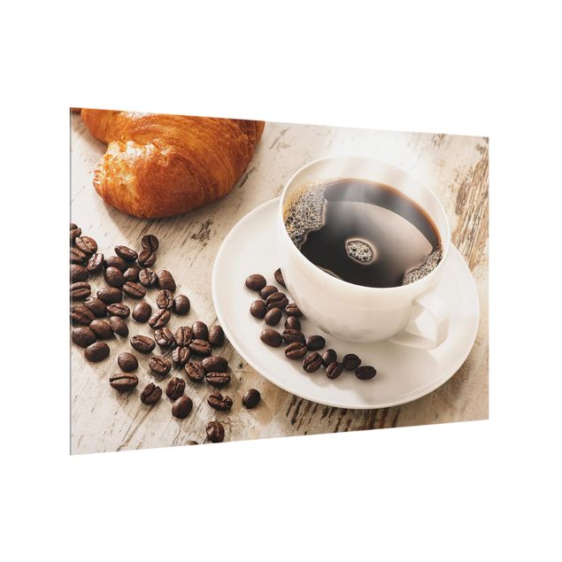 Splashback - Steaming coffee cup with coffee beans