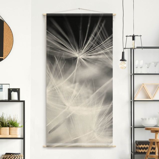 modern tapestry wall hanging Moving Dandelions Close Up On Black Background