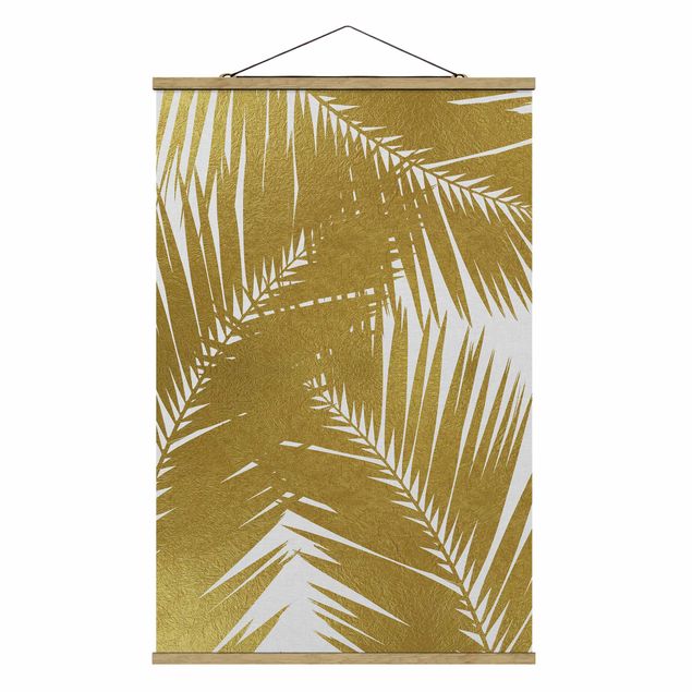 Fabric print with poster hangers - View Through Golden Palm Leaves - Portrait format 2:3
