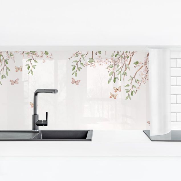 Kitchen splashbacks Cherry blossom in the butterflies' play of wings