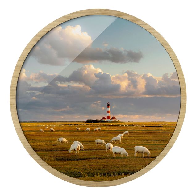 Circular framed print - North Sea Lighthouse With Flock Of Sheep