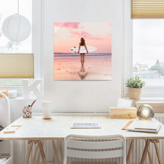 Glass print - Surfer Girl With Board At Sunset