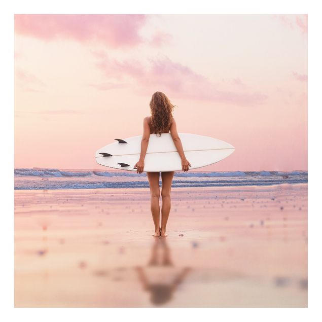 Glass print - Surfer Girl With Board At Sunset