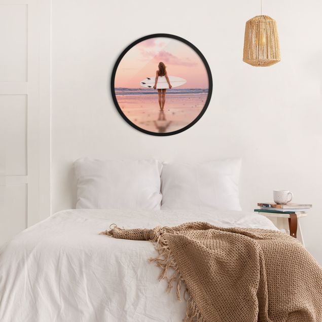 Circular framed print - Surfer Girl With Board At Sunset