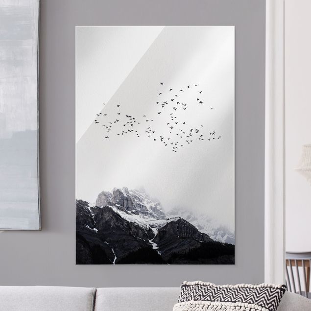 Glass print - Flock Of Birds In Front Of Mountains Black And White