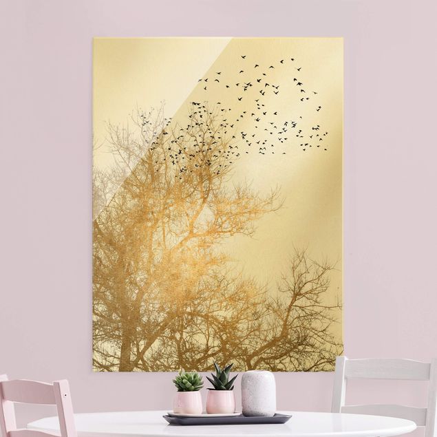 Glass print - Flock Of Birds In Front Of Golden Tree - Portrait format